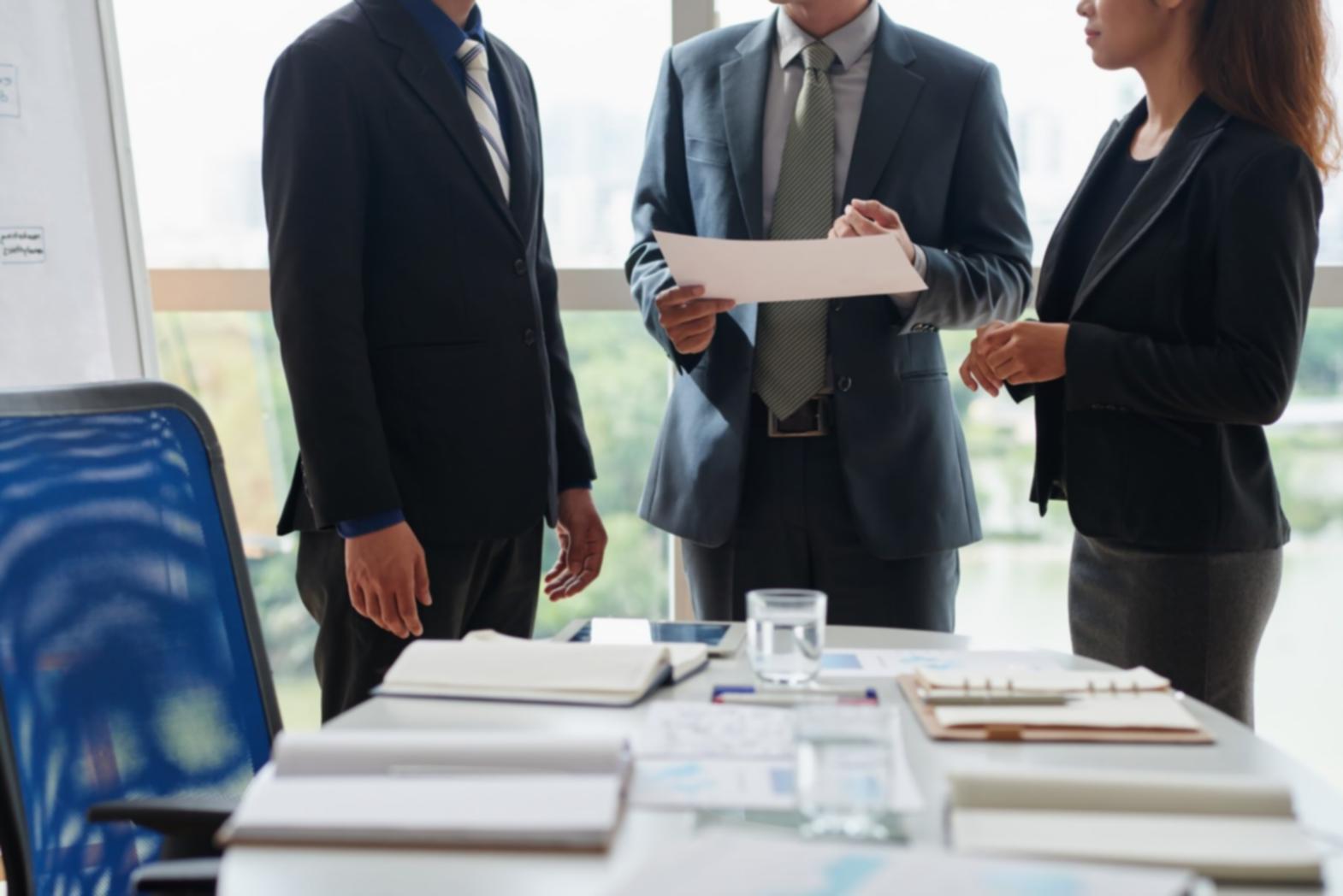 Trading classroom environment with multiple screens displaying live market data and volume analysis